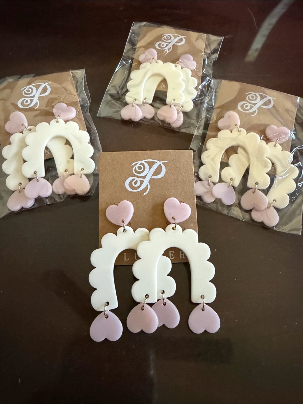 Plunder White and Light Pink Scalloped Arch Heart Dangle Earrings